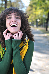 Image showing brunette Cute young woman  smiling 