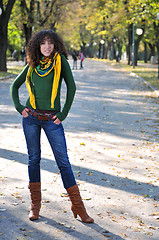 Image showing Young curly woman outdoors