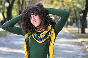 Image showing brunette Cute young woman  smiling 