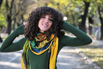 Image showing brunette Cute young woman  smiling 