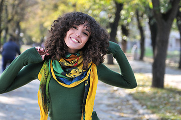 Image showing brunette Cute young woman  smiling 
