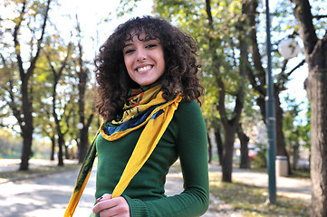 Image showing brunette Cute young woman  smiling 