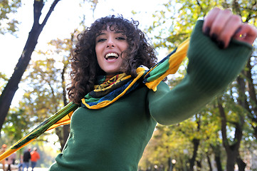 Image showing Young curly woman smiling 