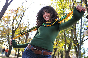 Image showing brunette Cute young woman  smiling 