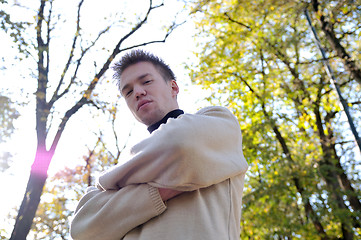 Image showing happy young casual man outdoor portrait posing