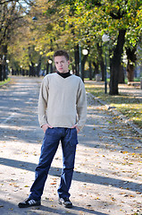 Image showing happy young casual man outdoor portrait posing