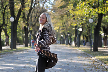 Image showing Cute young woman smiling 