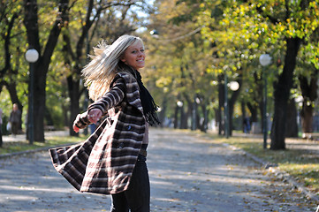 Image showing Cute young woman smiling 