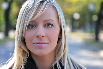 Image showing Cute young woman smiling 