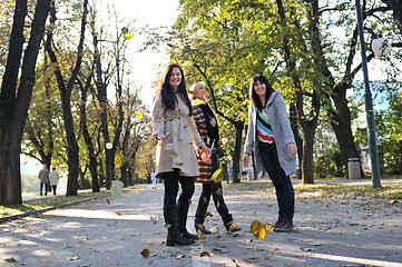 Image showing Happy three friends  outdoors