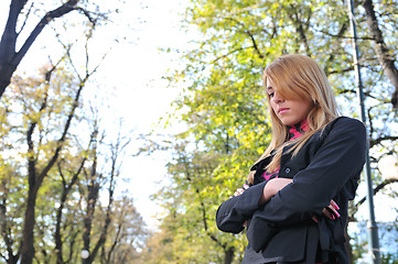 Image showing brunette Cute young woman posing outdoors