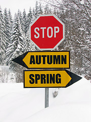 Image showing autumn or spring roadsign at cold winter day