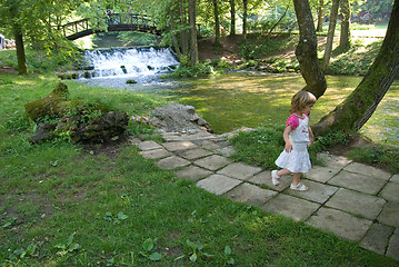 Image showing wooden bring over small waterfall 