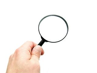 Image showing hand with magnifying glass