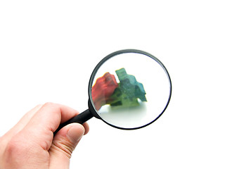 Image showing hand with magnifying glass