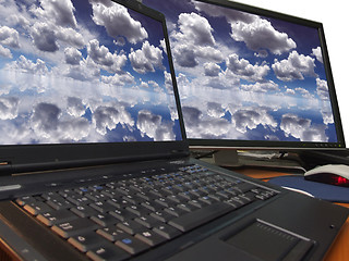 Image showing dramatic blue sky on dual display