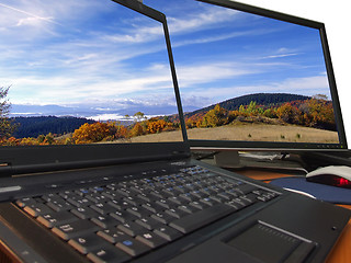 Image showing autumn landscape on sharp dual displey...