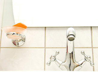 Image showing retro tap and orange soap