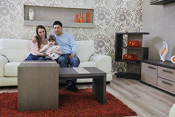 Image showing happy young family at home