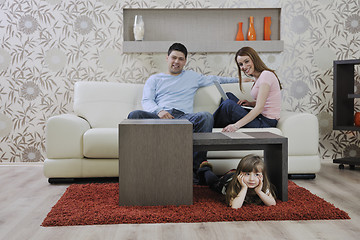 Image showing happy young family at home