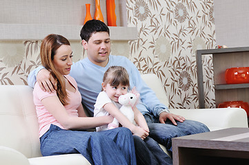 Image showing happy young family at home