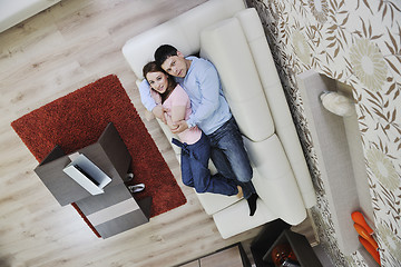 Image showing couple relax at home on sofacouple relaxing at home