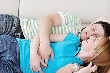 Image showing couple relax at home on sofa