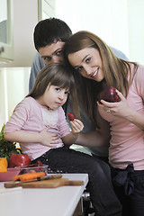 Image showing happy young family in kitchen