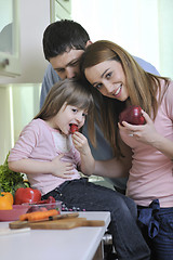 Image showing happy young family in kitchen