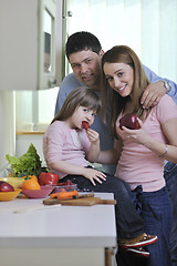 Image showing happy young family in kitchen