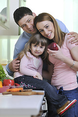 Image showing happy young family in kitchen