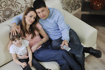 Image showing happy young family at home