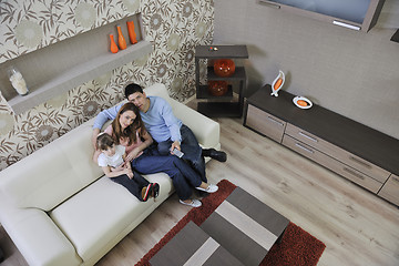 Image showing happy young family at home