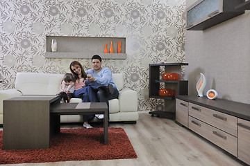 Image showing happy young family at home