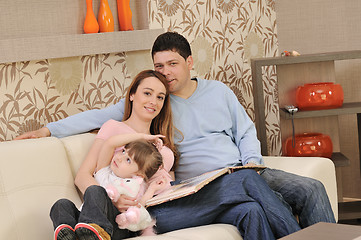 Image showing happy young family at home