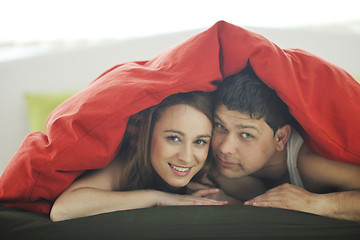 Image showing young couple in bed