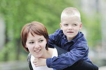 Image showing happy boy and mom outdoor