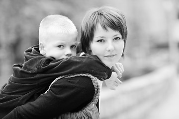 Image showing happy boy and mom outdoor