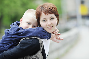 Image showing happy boy and mom outdoor