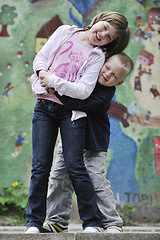 Image showing happy brother and sister outdoor in park