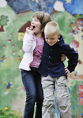 Image showing happy brother and sister outdoor in park