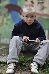 Image showing playing video games outdoor