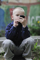 Image showing playing video games outdoor