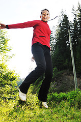 Image showing girl jump outdoor