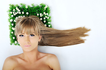 Image showing woman face on grass 