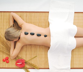Image showing Massage with hot volcanic stones
