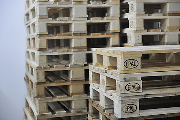 Image showing wooden palettes in warehouse