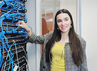 Image showing woman it engineer in network server room