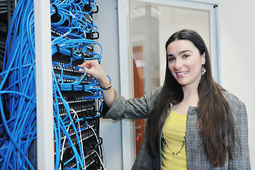 Image showing woman it engineer in network server room