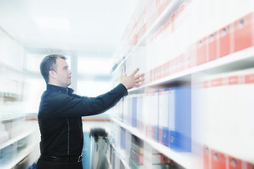 Image showing male adult in archive library